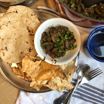 Plant Powered Chefs - Plant-based mushroom curry served with roti and papad - Caterers Near Me Plant Powered Chefs - Plant-based mushroom curry served with roti and papad - Caterers Near Me