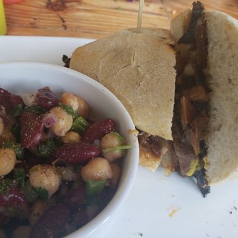 The Cafe - Pepper "steak" sandwich with side of bean salad - Sandwiches Near Me - Key West, Florida The Cafe - Pepper "steak" sandwich with side of bean salad - Sandwiches Near Me - Key West, Florida