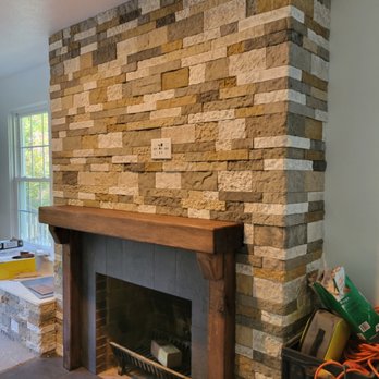 Peak Restoration - Hand crafted fireplace mantle and stone facelift - Handyman Near Me