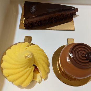 Maison Alyzee - Delicious cakes. The passion fruit didn't survive my rough carrying. - Bakeries Near Me - Mountain View, California