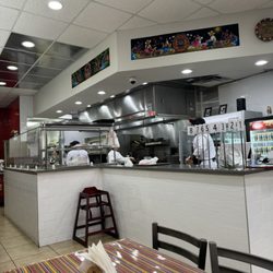 Quechuas Peru Restaurant - Open kitchen, you can see them preparing your meal.