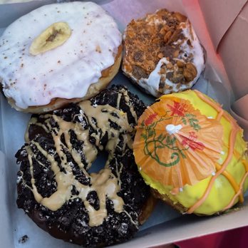 Voodoo Doughnut - Banana Cream Pie. Butterfingering. Passion. Old Dirty Bastard. - Donuts Near Me - San Antonio, Texas