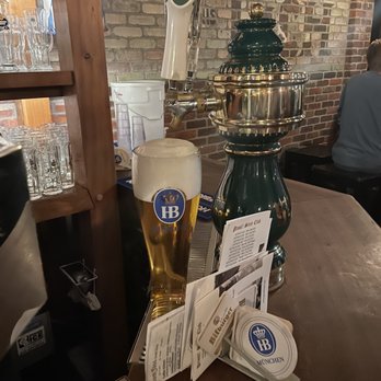 Prost! Boise - a beer and a beer glass on a bar - German Near Me - Boise, Idaho