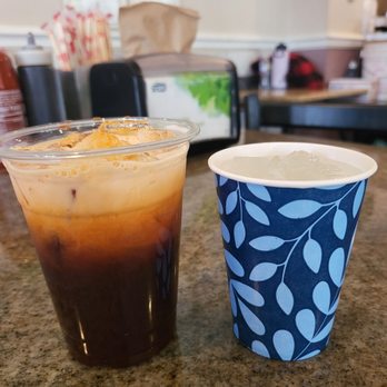 Pho 75 - Thai iced tea and cup of water - Vietnamese Near Me - Rockville, Maryland Pho 75 - Thai iced tea and cup of water - Vietnamese Near Me - Rockville, Maryland