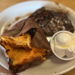 Texas Roadhouse - Early dine in 6 ounce sirloin medium well with a sweet potato plain