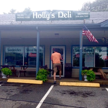Holly's Deli - a man entering the store - Delis Near Me - West Dennis, Massachusetts Holly's Deli - a man entering the store - Delis Near Me - West Dennis, Massachusetts