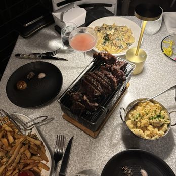 Castaway Burbank - Our ribeye, Pasta, Mac N Cheese and Fries - Bars Near Me - Burbank, California