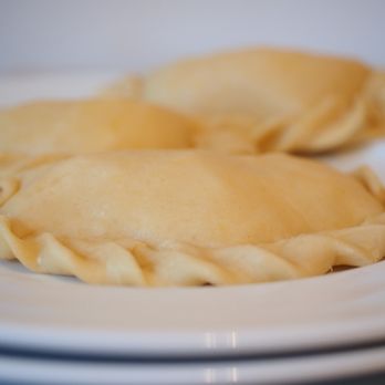 La Cantera - a closeup of two tortells on a plate - Empanadas Near Me - Toms River, New Jersey La Cantera - a closeup of two tortells on a plate - Empanadas Near Me - Toms River, New Jersey