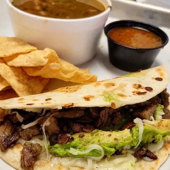 Dos Batos - Sizzling Pirata Taco with avocado and melty cheese, plus hot charro beans. #PirataPerfection #DosBatos - Tacos Near Me - Austin, Texas