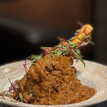 Azafran Indian Cuisine - Azitra - Lamb shank - Indian Near Me - Broomfield, Colorado Azafran Indian Cuisine - Azitra - Lamb shank - Indian Near Me - Broomfield, Colorado