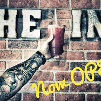 Idaho Nutrition Now - a person holding a drink in front of a brick wall - Juice Bars & Smoothies Near Me - Pocatello, Idaho Idaho Nutrition Now - a person holding a drink in front of a brick wall - Juice Bars & Smoothies Near Me - Pocatello, Idaho