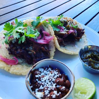 peasants FEAST - Carnitas tacos with pickled onions and cilantro. - American Near Me - Solvang, California