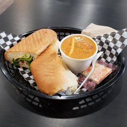 The CrateHouse - The Cajun Sandwich $10.00 and a cup of ravioli sausage soup $4.00.