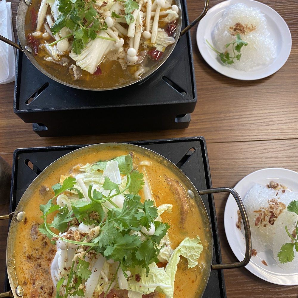 May Cafe - Mala hot pot (top) and creamy hot and sour hot pot (bottom) with glass noodles - Cafes Near Me - Lakewood, Washington May Cafe - Mala hot pot (top) and creamy hot and sour hot pot (bottom) with glass noodles - Cafes Near Me - Lakewood, Washington