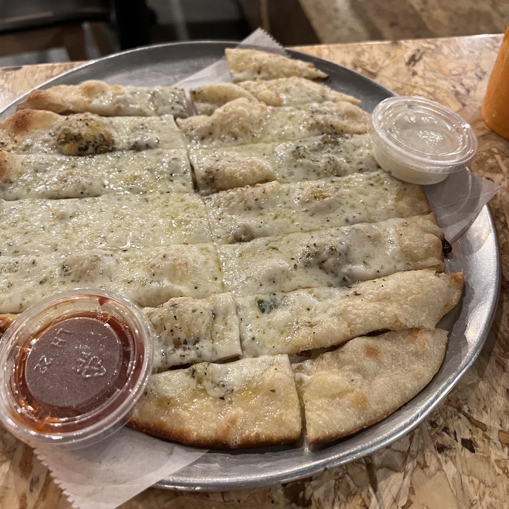 Curry Pizza - Garlic Naan Sticks - Pizza Near Me - West Valley City, Utah Curry Pizza - Garlic Naan Sticks - Pizza Near Me - West Valley City, Utah