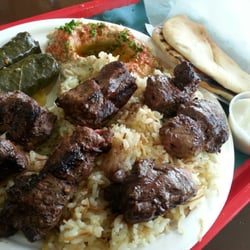 Kabab Crush - Beef kabab plate, w/ grape leaves, baba ghanouj, rice, garlic sauce & pita bread