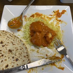 Chicken Tikka Masala with a side of Naan Chicken Tikka Masala with a side of Naan