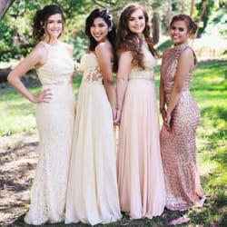 Our beautiful customers looking fabulous in their prom dresses. We had so much fun picking out dresses for their special day!