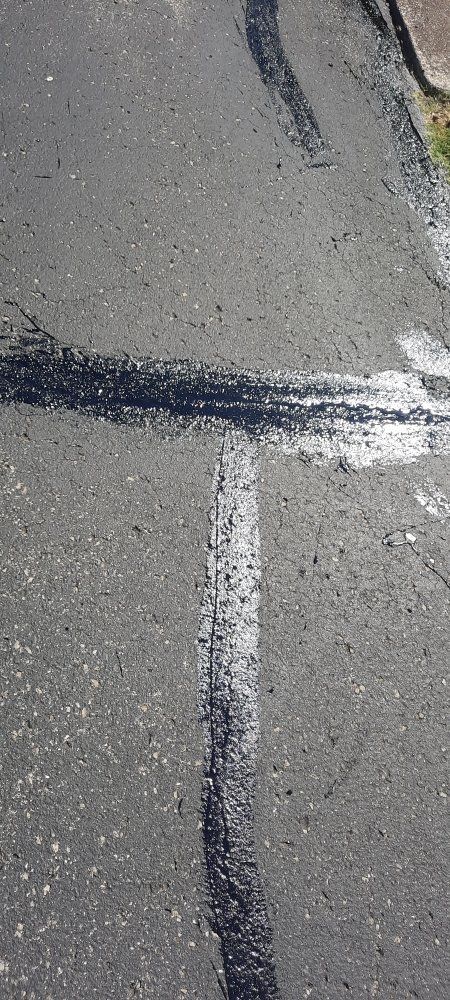 Slide of Asphalt Sealcoating & More