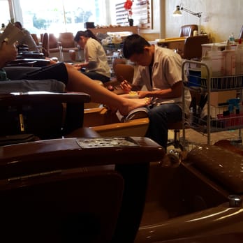 Top Nails and Spa - Nail techs working hard in a nice place - Nail Salons Near Me - Largo, Florida