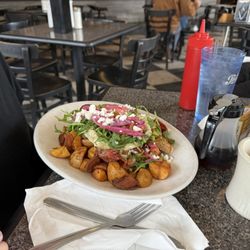Brio's Pizzeria & Restaurant - Avocado toast, arugula, potatoes, eggs, cheese