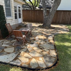JIT Landscape and Design - Inch and a half Oklahoma Flagstone with 4 inch black bender board and Oklahoma decomposed granite fill