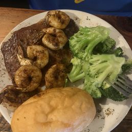 Ribeye with blackened shrimp ($5 upcharge), steamed broccoli ($2 upcharge) and bread