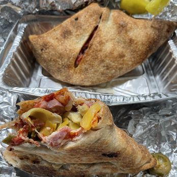 Pine Grove Pizza - Calzone with ham,pineapple, jalapeños and artichoke!! - Pizza Near Me - Pine Grove, California