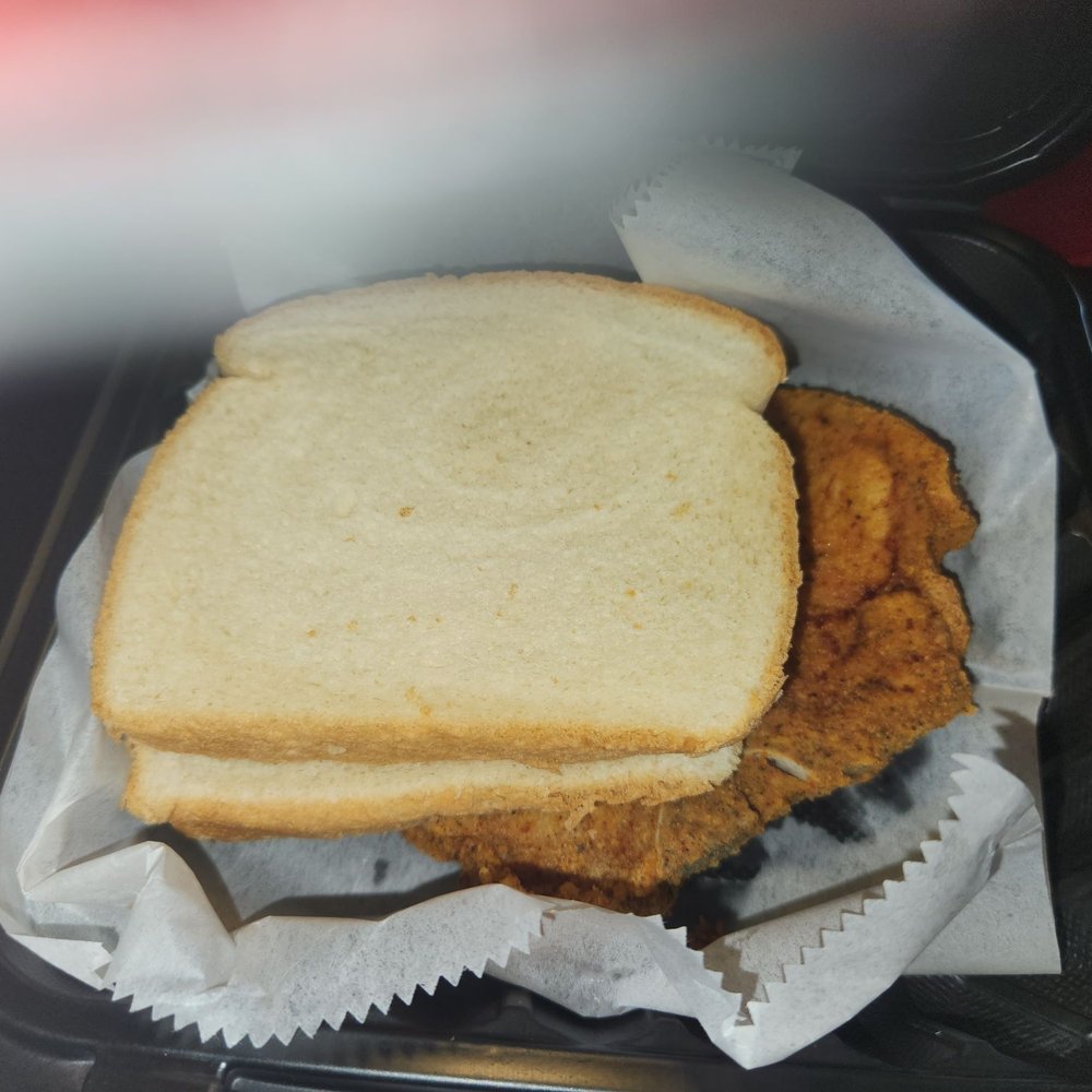 Ka'ribbean Fire - Pork chop sandwich. Needed some mayo or mustard on the bread. - Caribbean Near Me - La Plata, Maryland Ka'ribbean Fire - Pork chop sandwich. Needed some mayo or mustard on the bread. - Caribbean Near Me - La Plata, Maryland