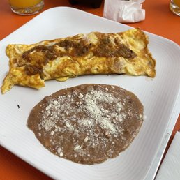Bacon, spinach, cheese omelet with frijoles