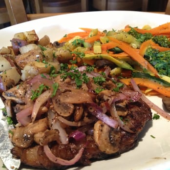 Redondo Beach Brewing - Ribeye - Grilled angus steak topped with mushroom & onions sauteed in tarragon butter. With vegetables & herb roasted potatoes. - American Near Me - Redondo Beach, California Redondo Beach Brewing - Ribeye - Grilled angus steak topped with mushroom & onions sauteed in tarragon butter. With vegetables & herb roasted potatoes. - American Near Me - Redondo Beach, California