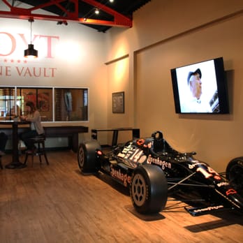 Foyt Wine Vault - Enjoy a glass of wine and some local cheeses next to AJ Foyt's 1991 Copenhagen IndyCar - Wine Bars Near Me - Indianapolis, Indiana