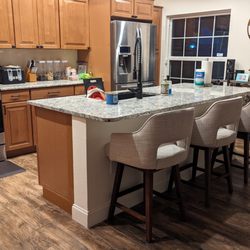 Zorcon Contracting - Carlos and his crew redid my kitchen island. Before, it was a 2-tier island that was too high to sit at. Now it's functional and pretty!