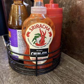 Jenny Pho - Condiments (sriracha, hoisin sauce, chili paste, soy sauce, and chili oil) - Vietnamese Near Me - Issaquah, Washington