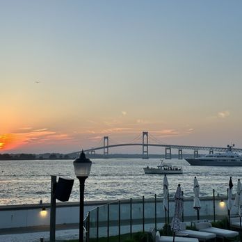 The Pineapple Club - a sunset over the water - Bars Near Me - Newport, Rhode Island