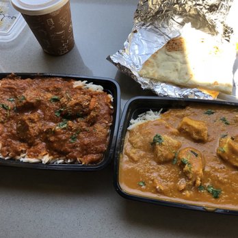 The Tikka Bar - two containers of food on a table - Indian Near Me - Victoria, British Columbia The Tikka Bar - two containers of food on a table - Indian Near Me - Victoria, British Columbia