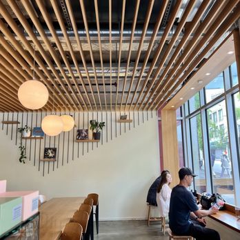 Nemesis Coffee - Love the natural wood accents, clean lines and plants! - Cafes Near Me - Vancouver, British Columbia