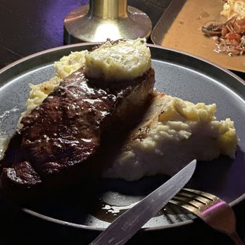 Pharmacy Kitchen & Bar - Why is the butter not melting on the steak, hmmmm...? - Steakhouses Near Me - Goshen, New York