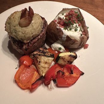 The Keg Steakhouse + Bar - Blue cheese bacon wrapped sirloin steak with a loaded baked potato and grilled veggies!! - Steakhouses Near Me - Toronto, Ontario