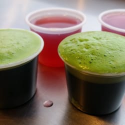 Keva Juice - Enjoying two shots of Wheatgrass with raspberry juice chasers. Very healthy!