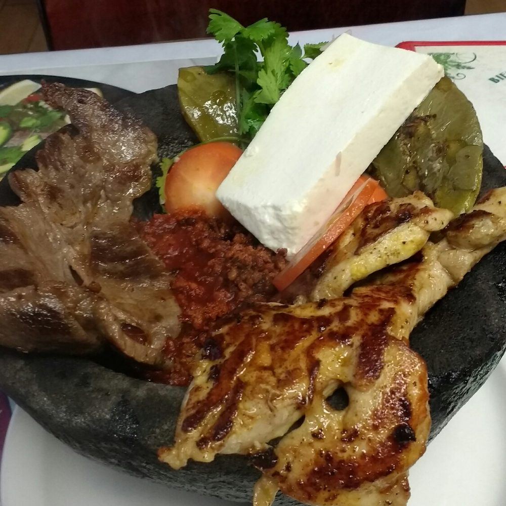 Fonda La Meche No 1 - All this on a hot clay stone bowl that one would use to smash guac. This has cactus, chicken, beef, chorizo, and cheese. Lechadora Azteca. - Mexican Near Me - Stanton, California Fonda La Meche No 1 - All this on a hot clay stone bowl that one would use to smash guac. This has cactus, chicken, beef, chorizo, and cheese. Lechadora Azteca. - Mexican Near Me - Stanton, California