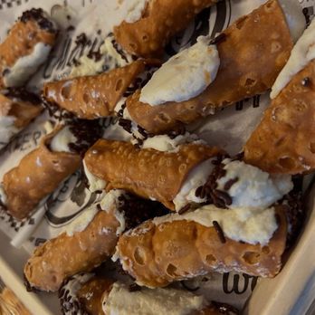 Maria's Italian Kitchen - Mini Cannolis Great tasting with small chunks of citrus candy fruit - Italian Near Me - Sherman Oaks, California Maria's Italian Kitchen - Mini Cannolis Great tasting with small chunks of citrus candy fruit - Italian Near Me - Sherman Oaks, California
