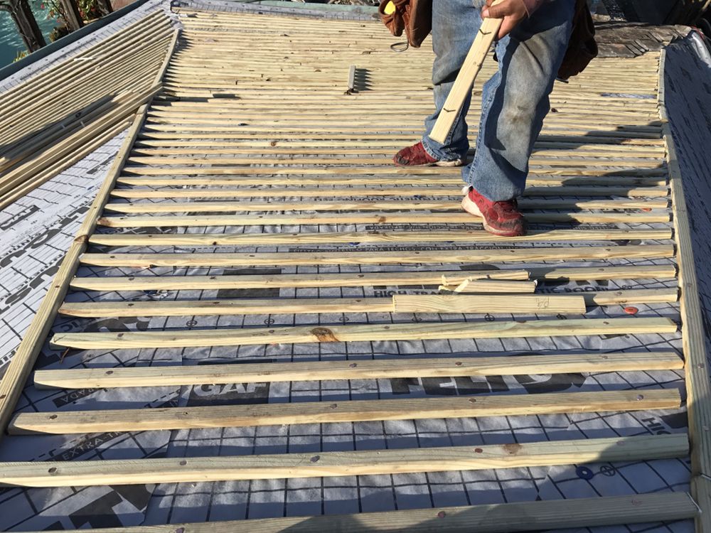 Slide of Fleur De Lis Roofing of New Orleans