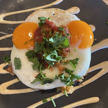 Village Taphouse - Looks like a face. Huevos rancheros - Canadian (New) Near Me - West Vancouver, British Columbia Village Taphouse - Looks like a face. Huevos rancheros - Canadian (New) Near Me - West Vancouver, British Columbia