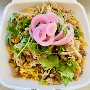 Mamacitas - Arroz con Gandules bowl with pernil, topped with homemade pickled red onion and cilantro - Puerto Rican Near Me - Syracuse, New York Mamacitas - Arroz con Gandules bowl with pernil, topped with homemade pickled red onion and cilantro - Puerto Rican Near Me - Syracuse, New York