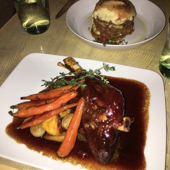 Pylos - Lamb shank front, beef moussaka in the back - Greek Near Me - New York, New York