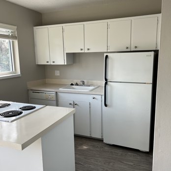 Supreme Remodeling - Freshly painted white cabinets. - Flooring Near Me Supreme Remodeling - Freshly painted white cabinets. - Flooring Near Me