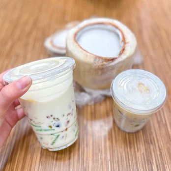 Thach Che Hien Khanh - a hand holding a jar of yogurt - Desserts Near Me - Garden Grove, California Thach Che Hien Khanh - a hand holding a jar of yogurt - Desserts Near Me - Garden Grove, California