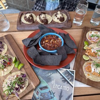 El Encanto - Left - Mahi mahi tacos, middle - Queso, right - Tinga de pollo tacos. - Bars Near Me - Kirkland, Washington