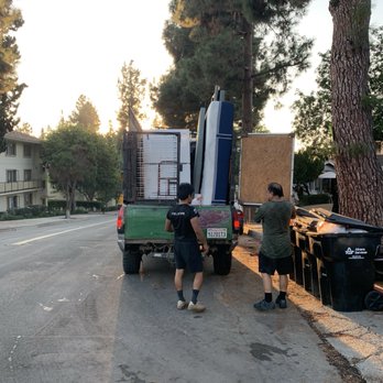 Bryan and Sons Junk Removal - Company working to load items - Junk Removal & Hauling Near Me